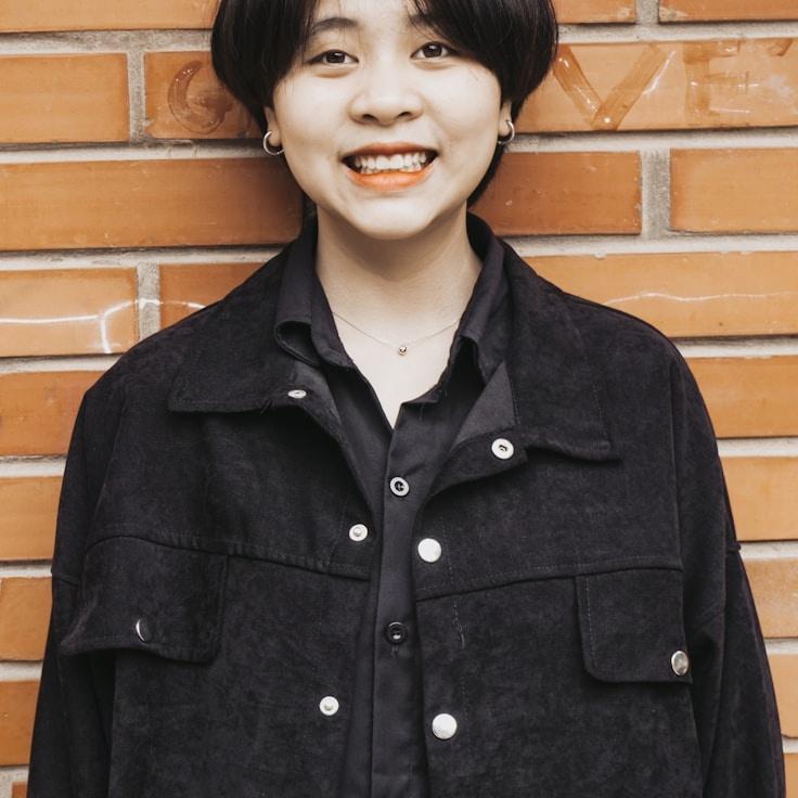 Anika Rao, Lead Design Curator at BalancePaperPlane, reviewing corporate floral arrangements